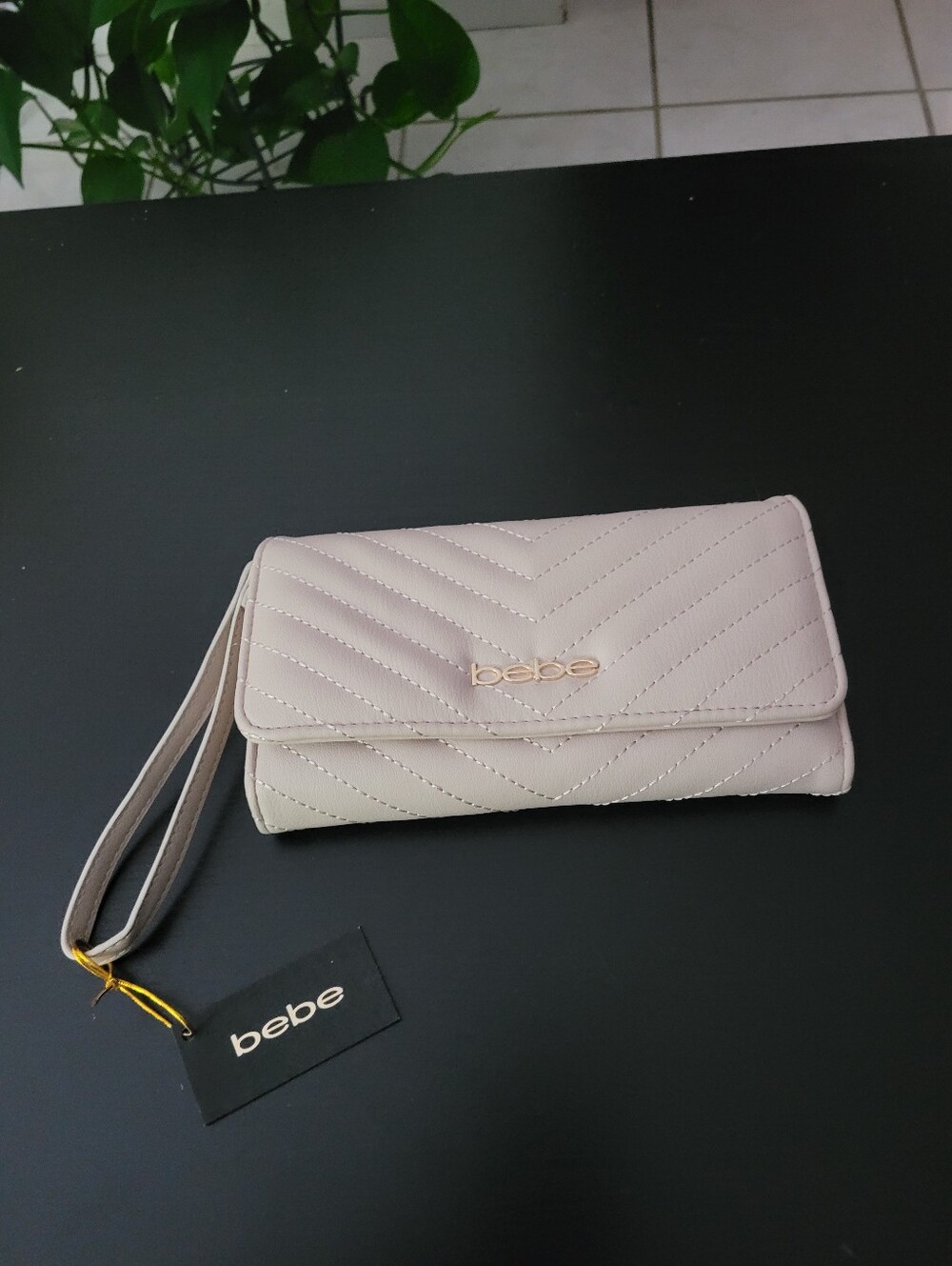 bebe Quilted Tan Wristlet Clutch